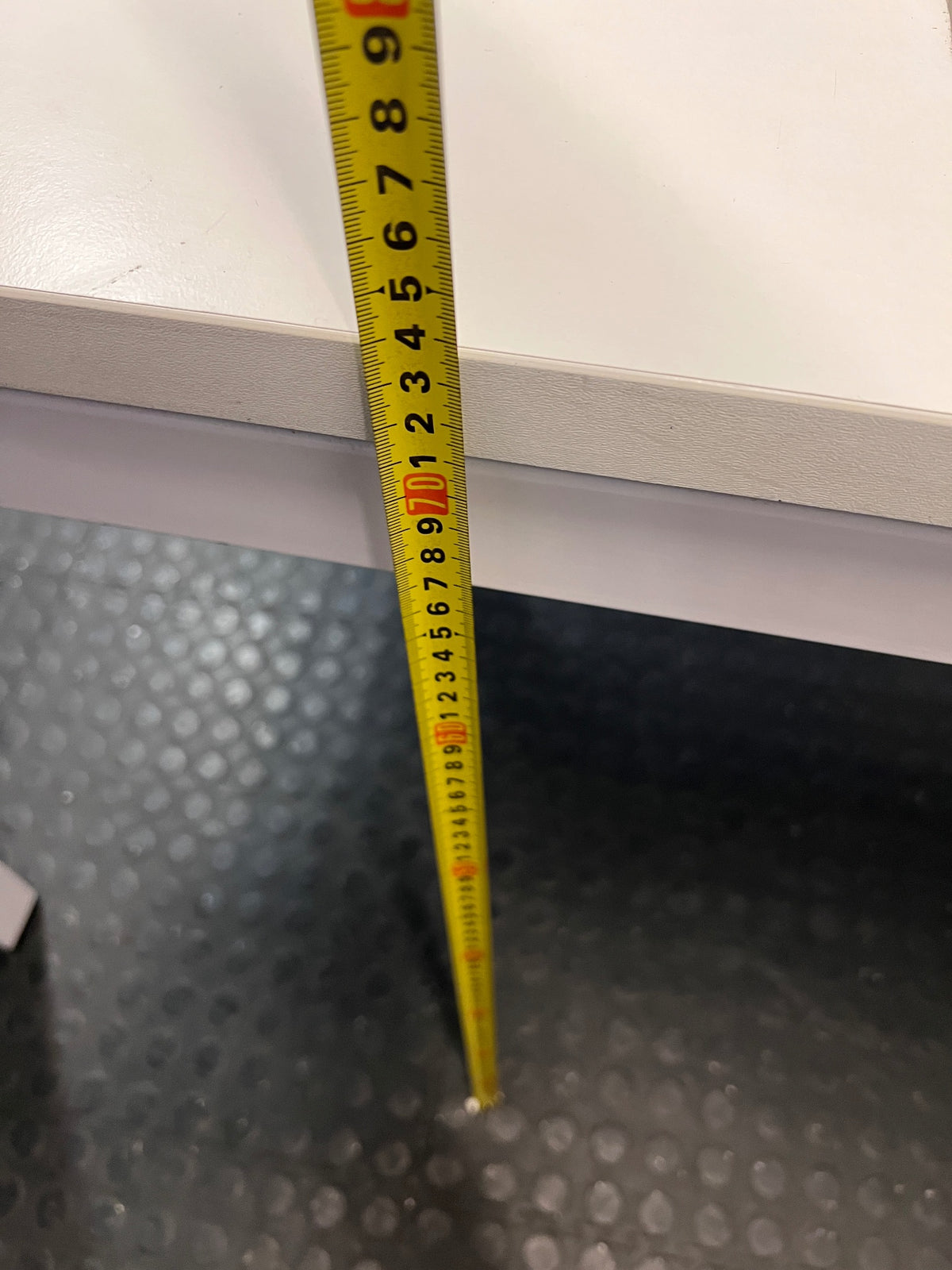 White Office Desk with Integrated Power Module — Signs of Transit Damage – height measurement