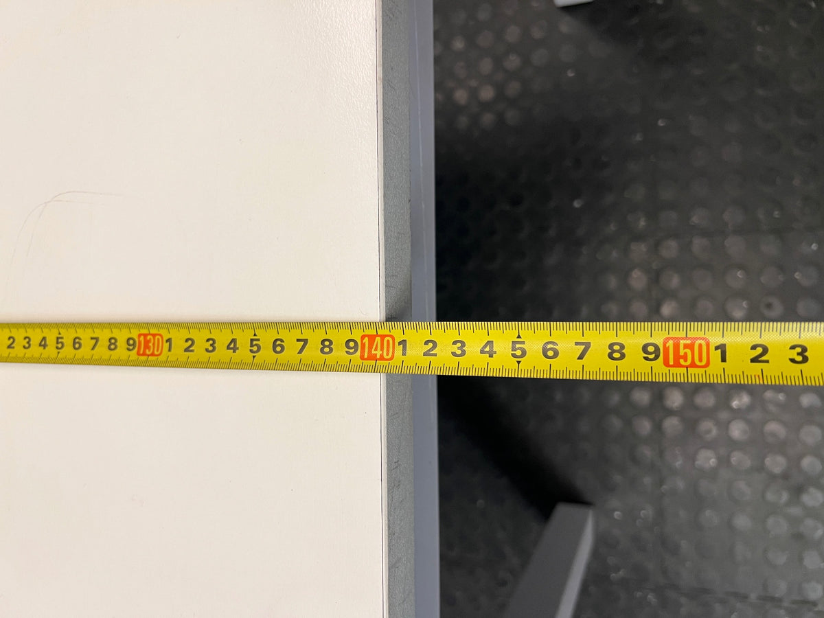 White Office Desk with Integrated Power Module — Signs of Transit Damage – width measurement
