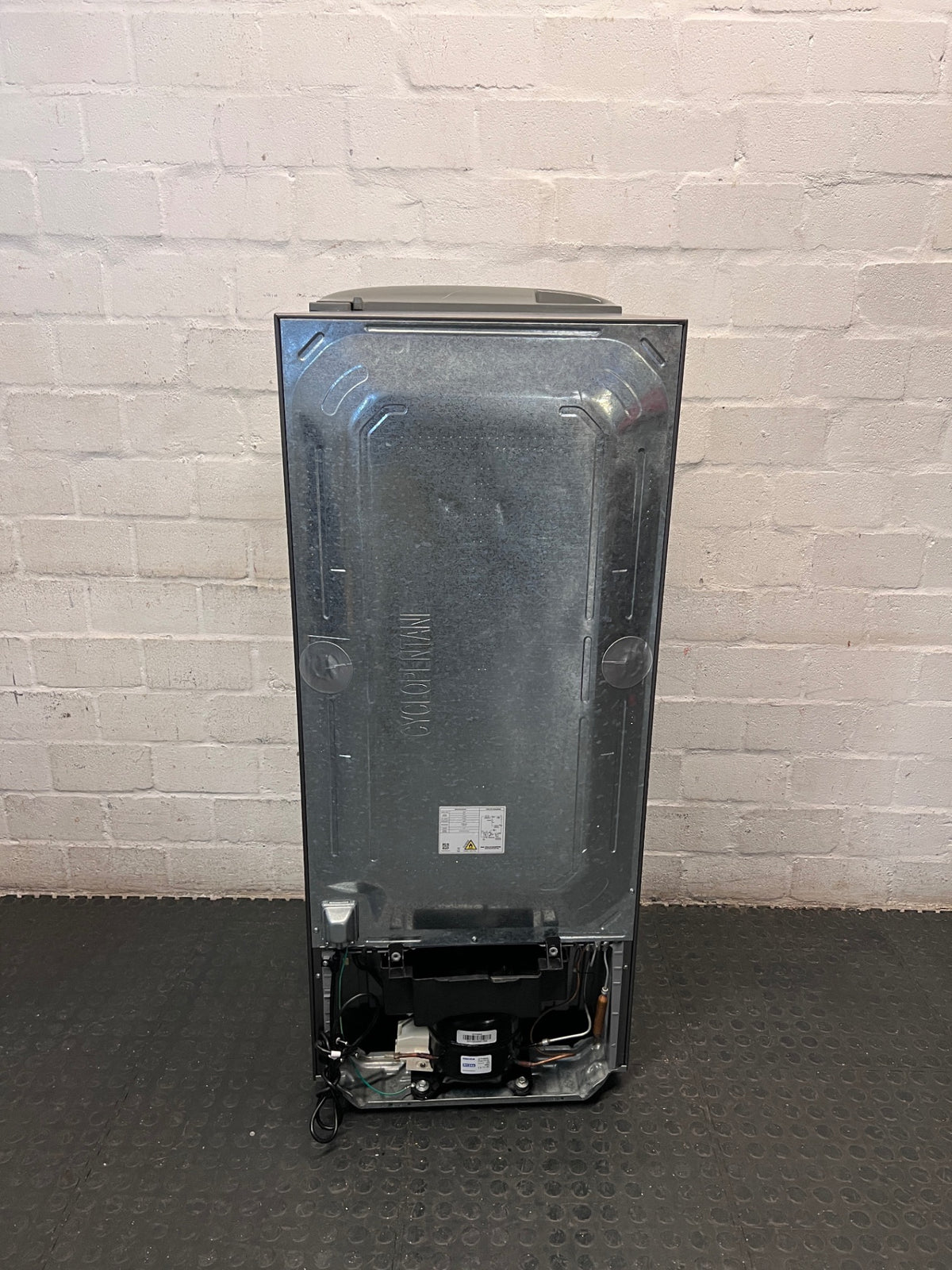Samsung Silver Single Door Fridge — Working Well with Dents on Door – back view