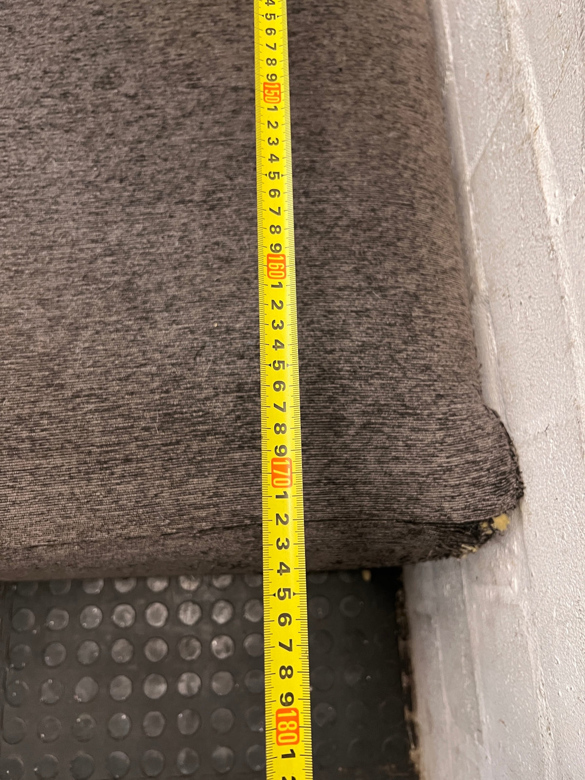 Grey Textured Fabric L-Shape Couch — Damaged and Worn Condition – depth measurement