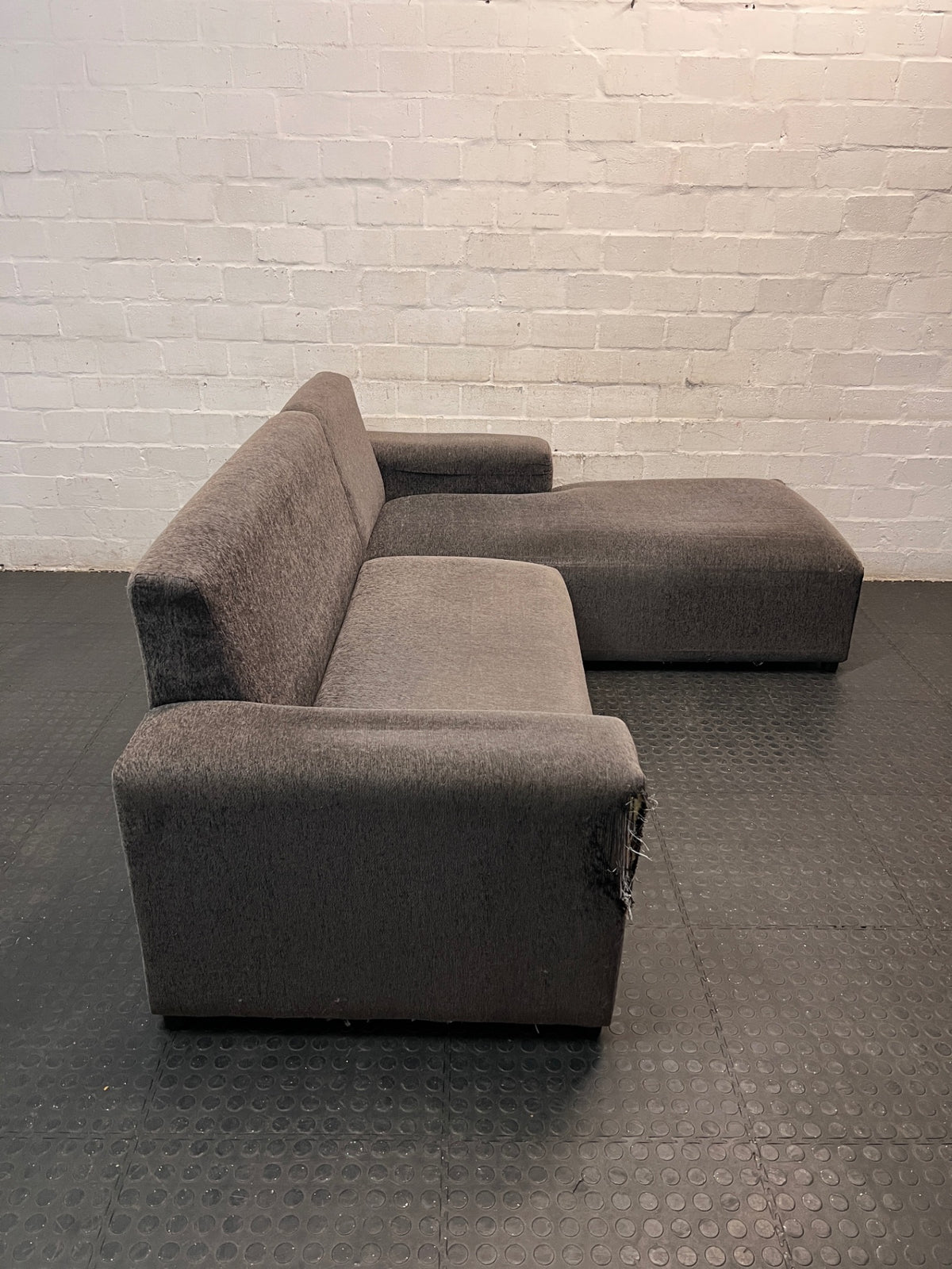 Grey Textured Fabric L-Shape Couch — Damaged and Worn Condition – top view