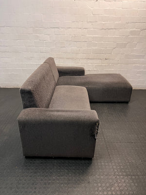 Grey Textured Fabric L-Shape Couch — Damaged and Worn Condition – top view