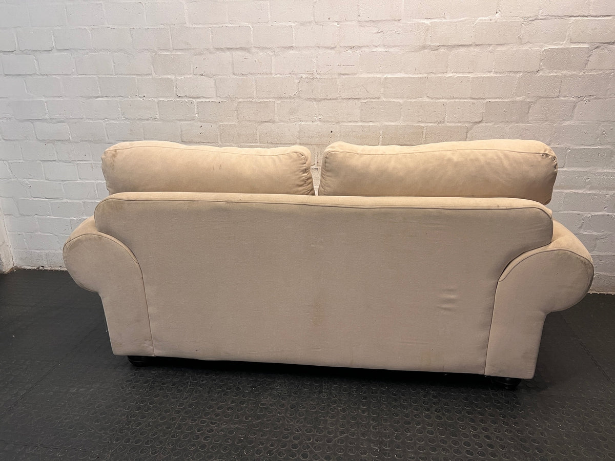 Beige Slouch Style 2 Seater Coricraft Couch — Small Mark on One Cushion – condition detail