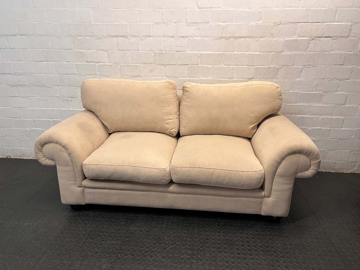 Beige Slouch Style 2 Seater Coricraft Couch — Small Mark on One Cushion – main front view