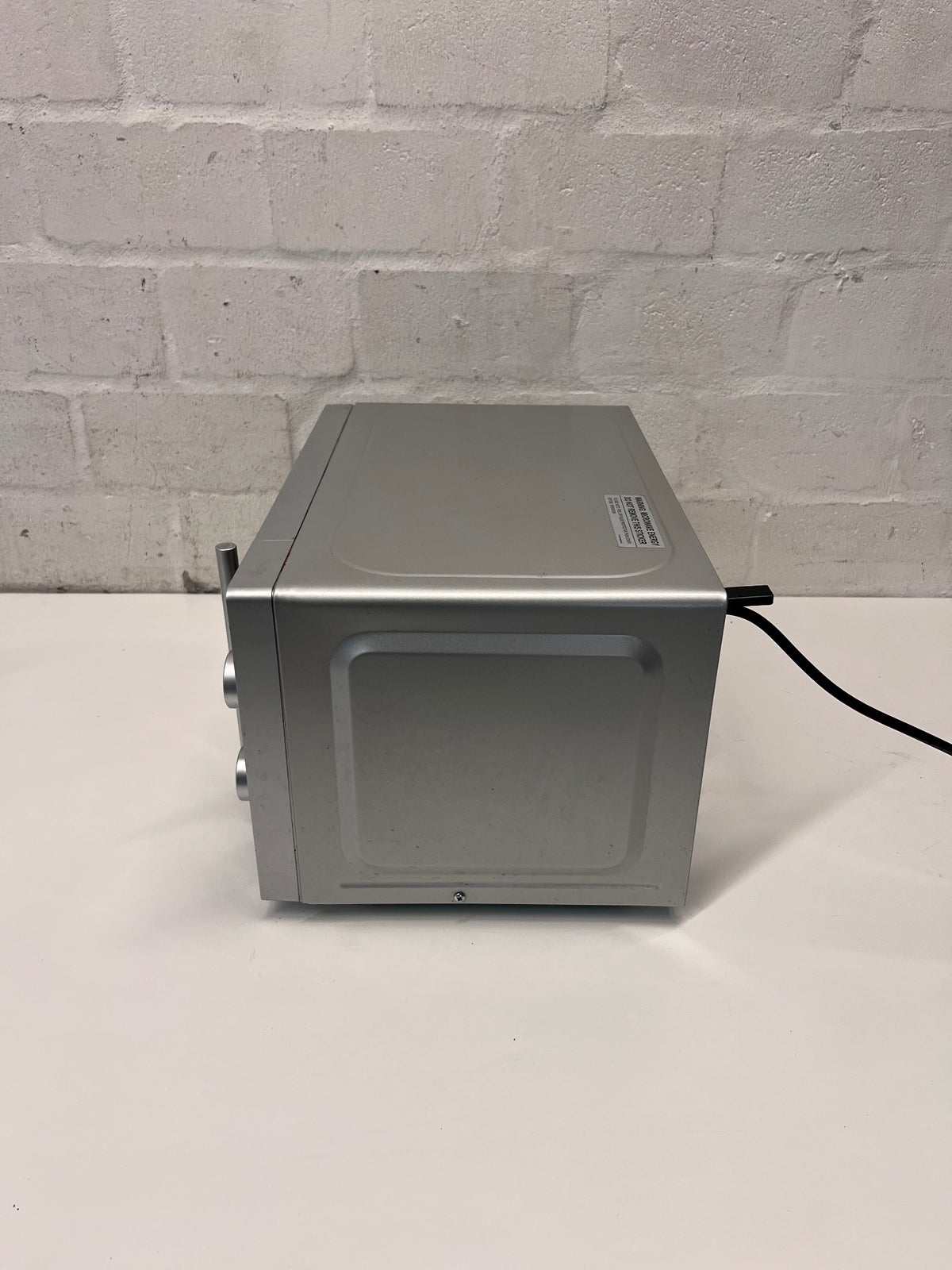 Silver Russell Hobbs Mirror Microwave — Working Well with Slight Surface Rust – condition detail