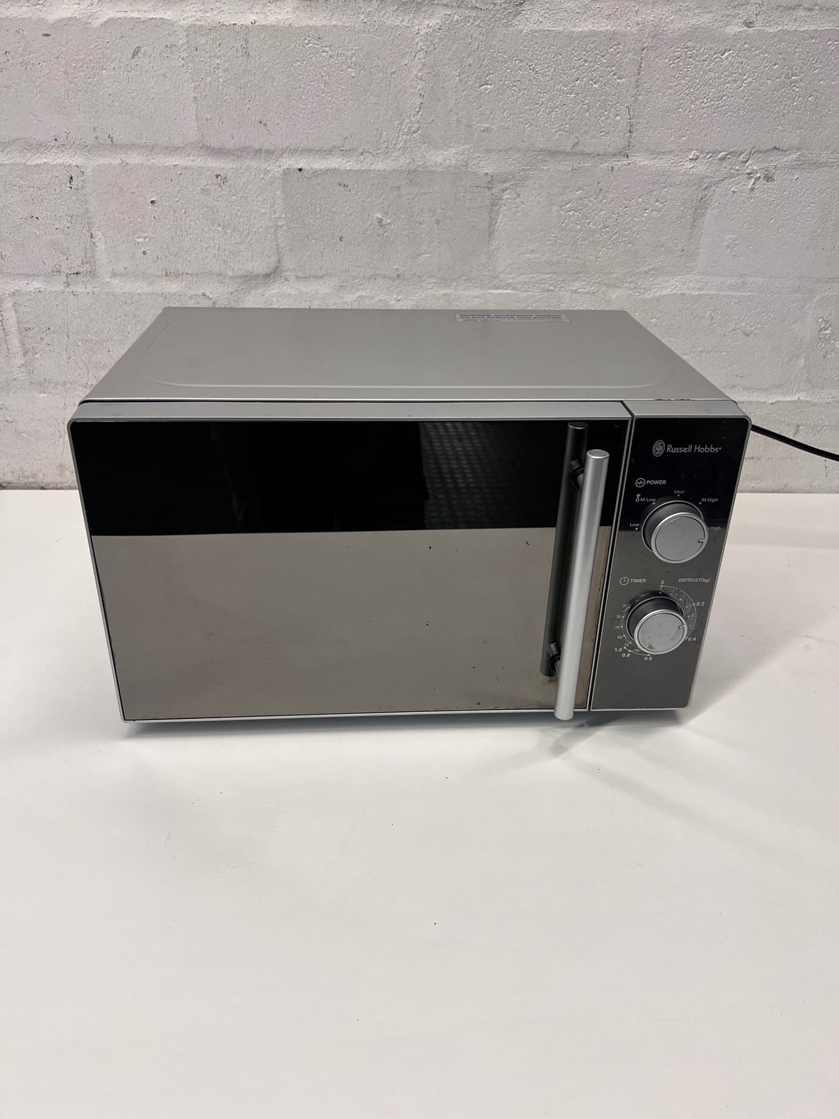 Silver Russell Hobbs Mirror Microwave — Working Well with Slight Surface Rust – main front view