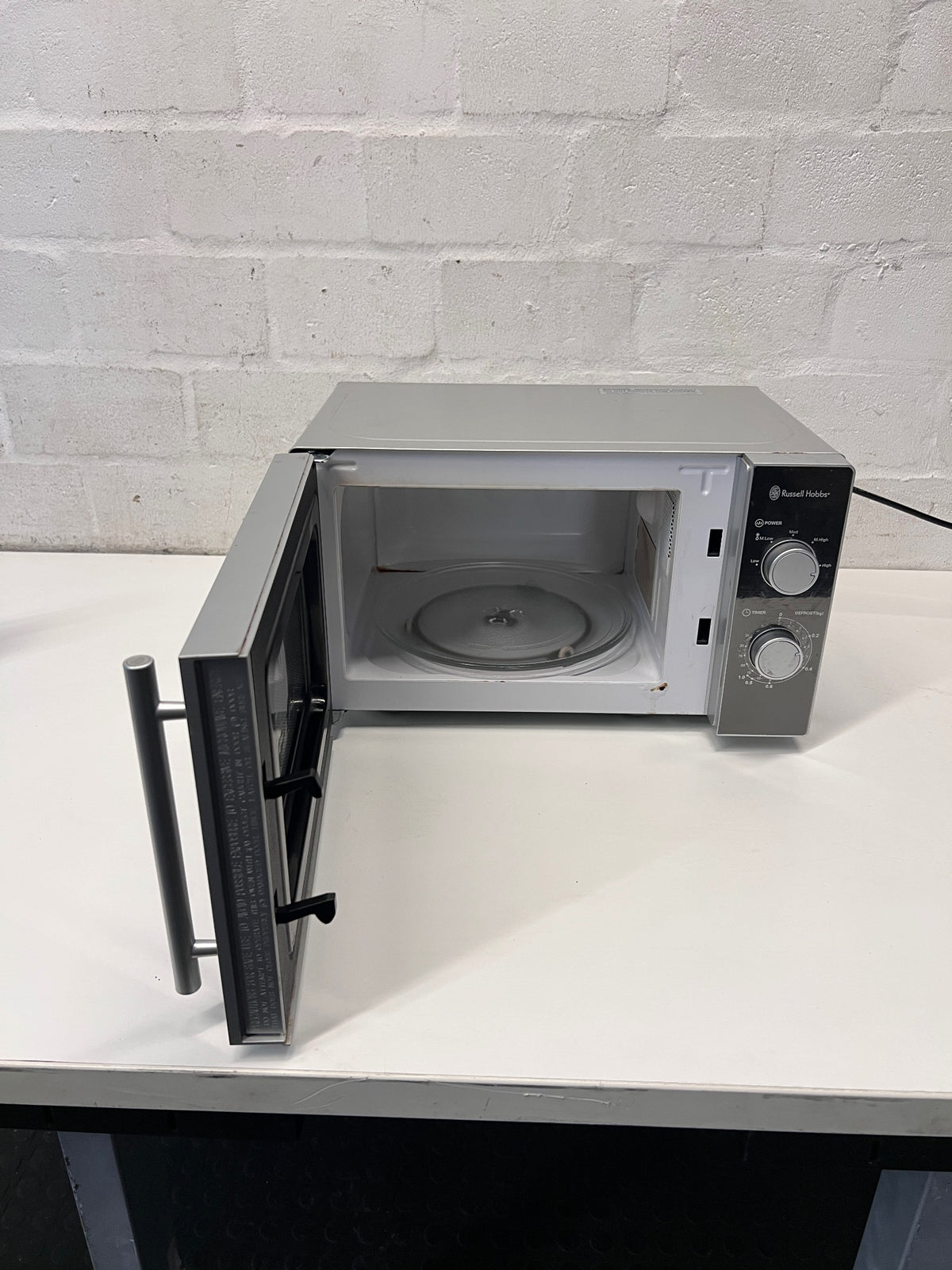 Silver Russell Hobbs Mirror Microwave — Working Well with Slight Surface Rust – side view