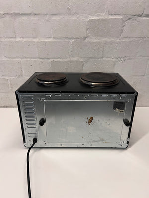 Black Fussion Two-Plate Countertop Stove and Oven — Working Order with Visible Rust – condition detail