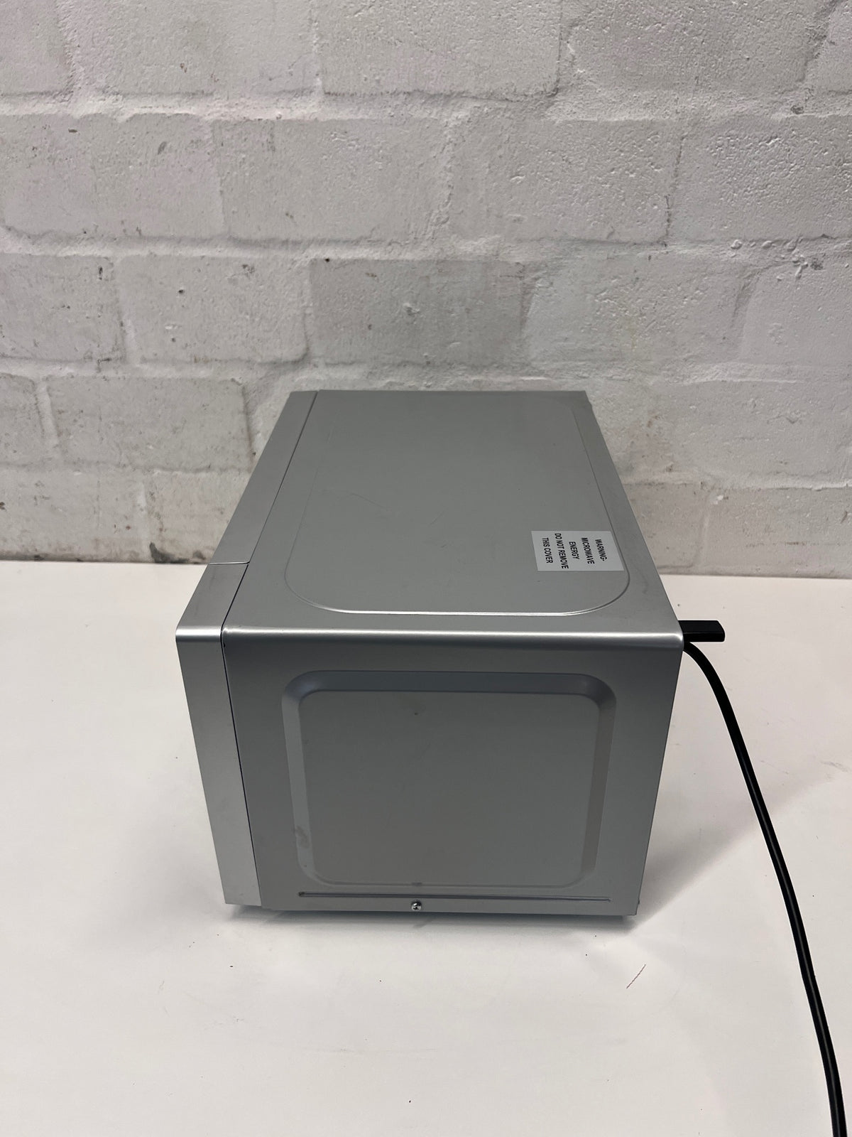 Hisense Silver Countertop Microwave with Mirrored Door — Good Working Order; Used Fair Condition – condition detail
