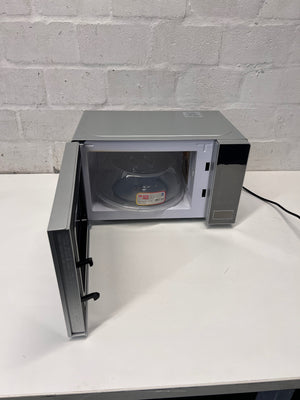 Hisense Silver Countertop Microwave with Mirrored Door — Good Working Order; Used Fair Condition – side view
