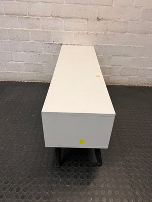 Low-Profile White TV Unit with Tapered Legs — Fair Condition With Visible Wear – top view