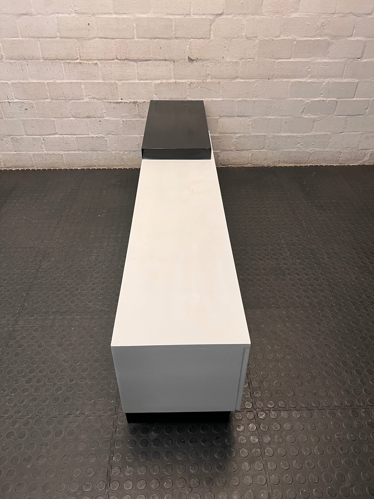 Modern Two-Tone Asymmetric TV Unit — Fair Used Condition – top view