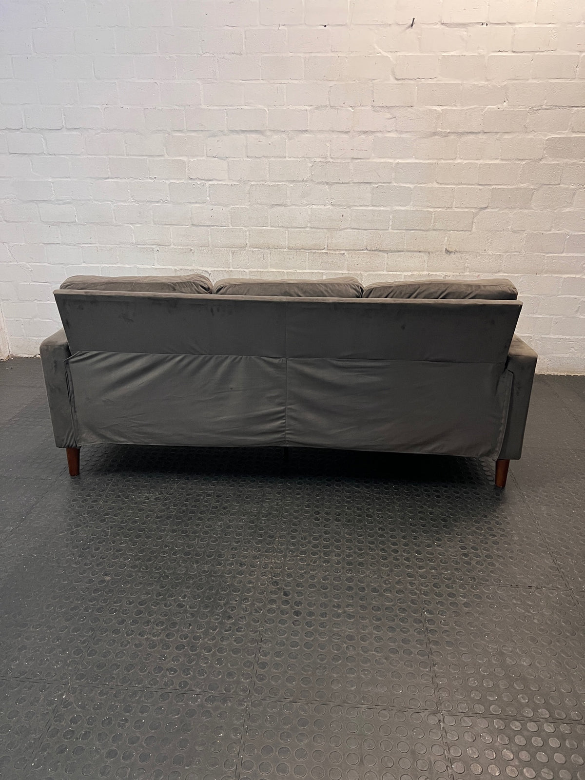 Grey Velvet-Style L-Shape Couch with Tapered Wooden Legs — Well Used Condition – back view