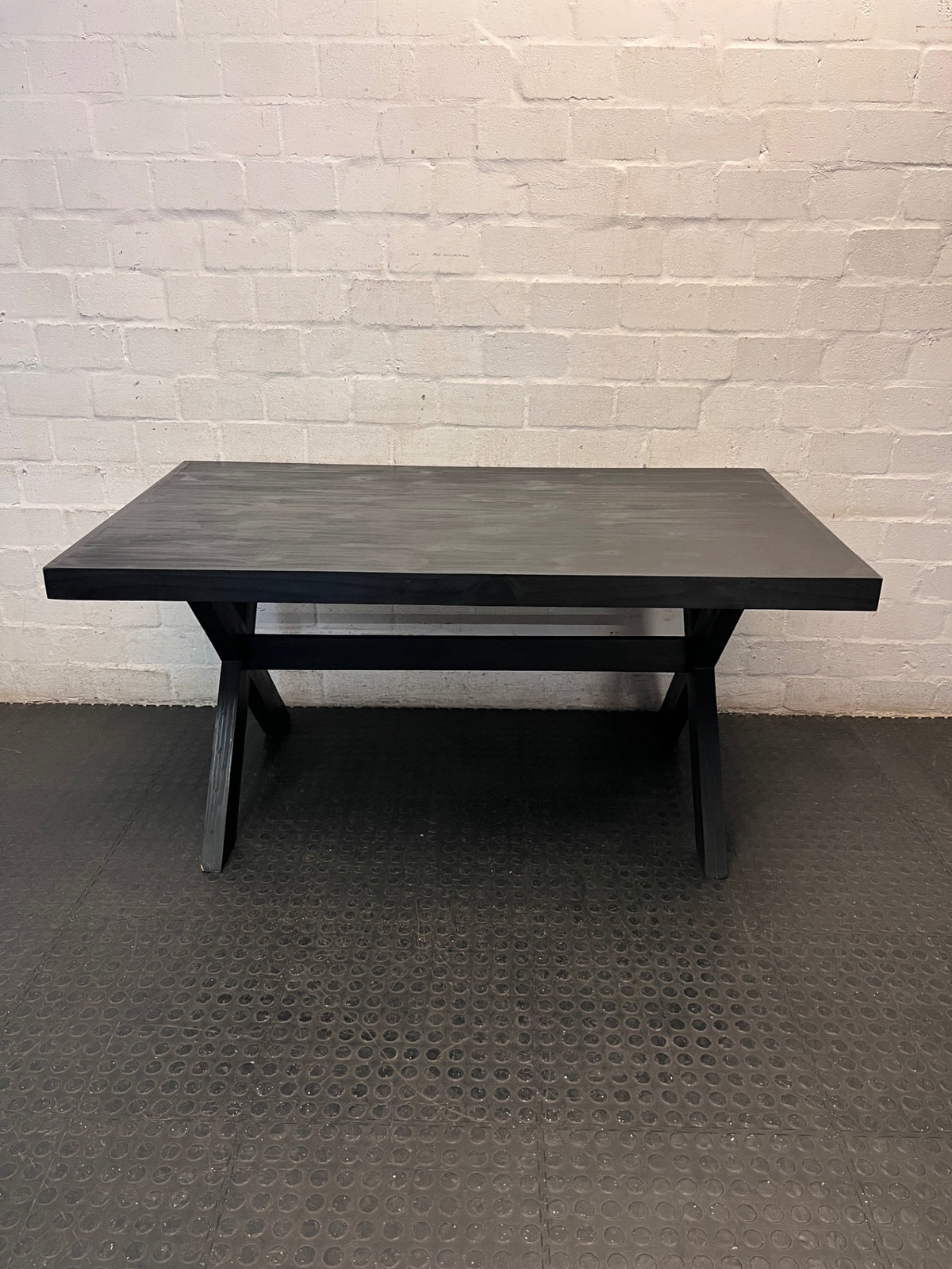 Dark Trestle-Style Wooden Dining Table — Crack on Top and Surface Scratches – back view