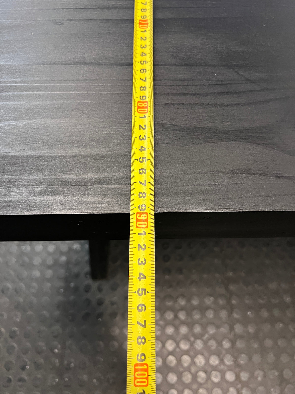 Dark Trestle-Style Wooden Dining Table — Crack on Top and Surface Scratches – depth measurement