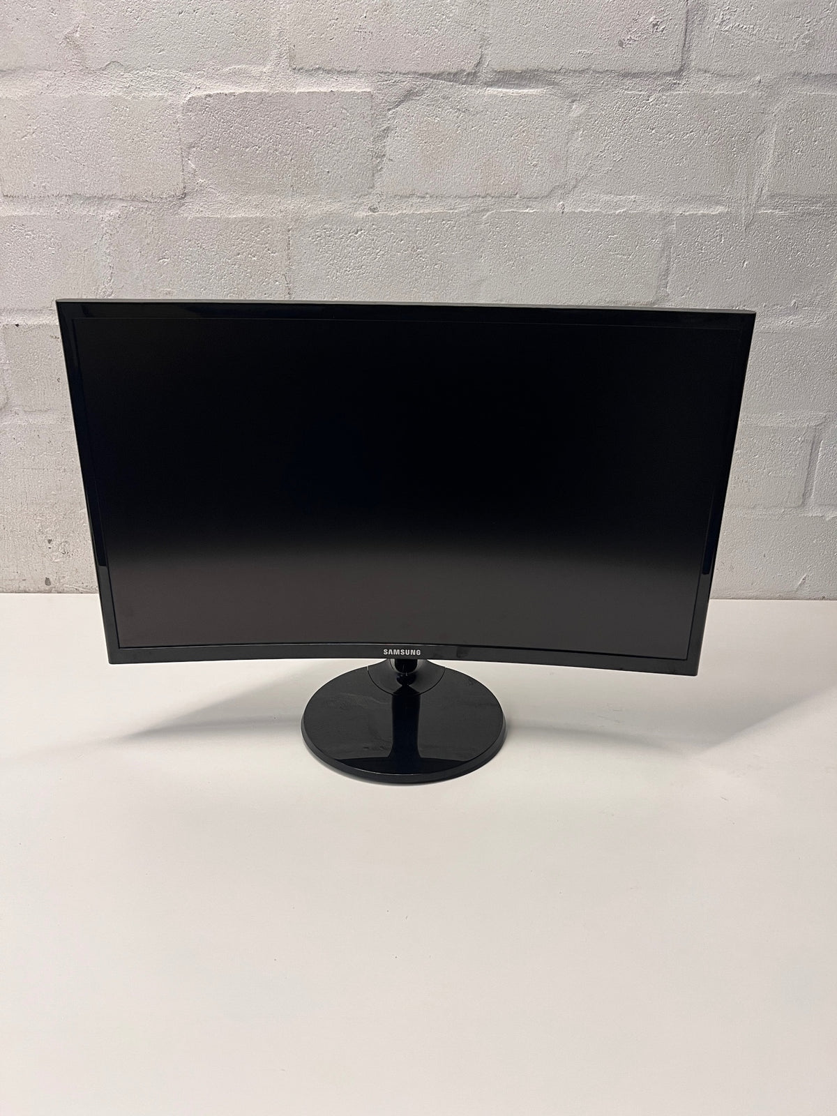 Samsung Curved Computer Monitor with Circular Stand — No Power Adapter Included – main front view