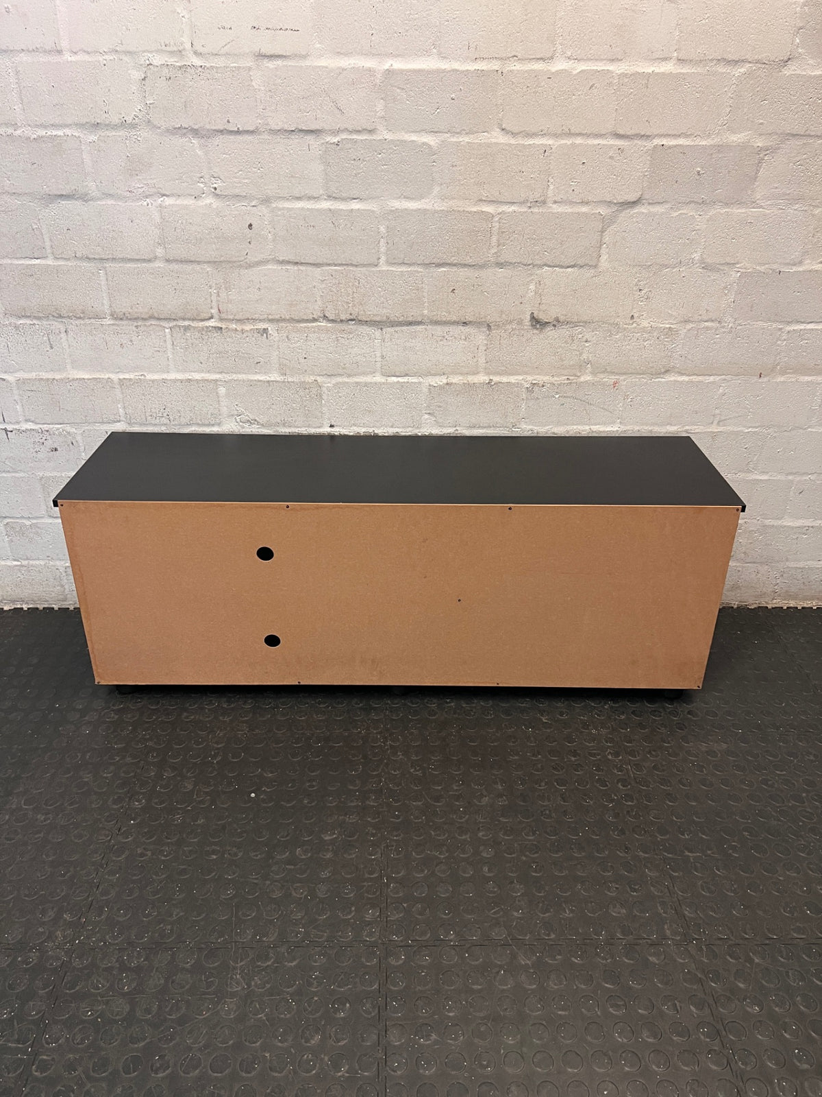Black Low-Profile TV Unit with Cupboard and Shelving — Minor Surface Scratches – back view