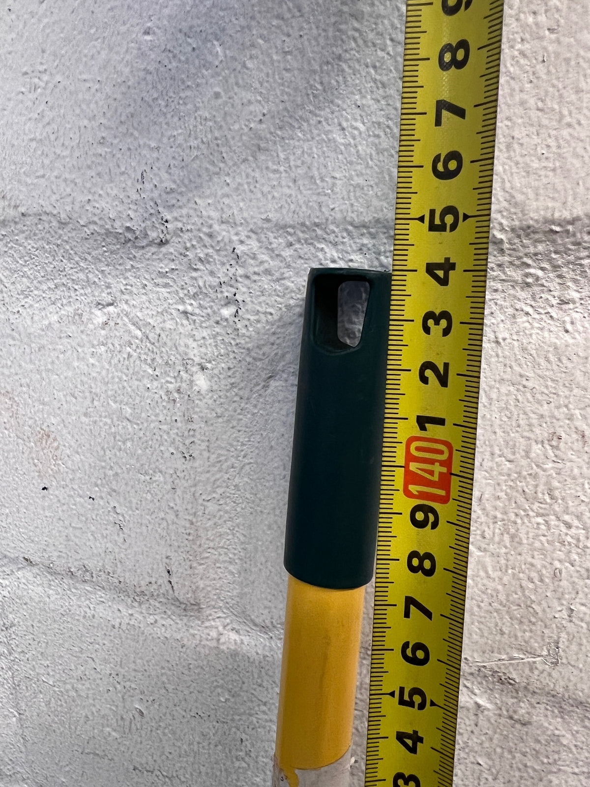 Plastic Leaf Rake with Long Yellow Handle – height measurement