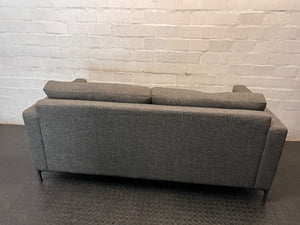 Coricraft Dark Grey 2 Seater Couch — Worn Fabric and Internal Squeak – condition detail