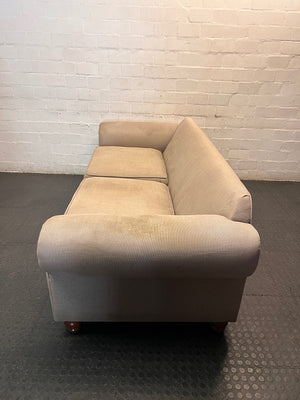 Grey Upholstered Two-Seater Couch with Rolled Arms — Good to Fair Condition with Marks on Armrest – back view