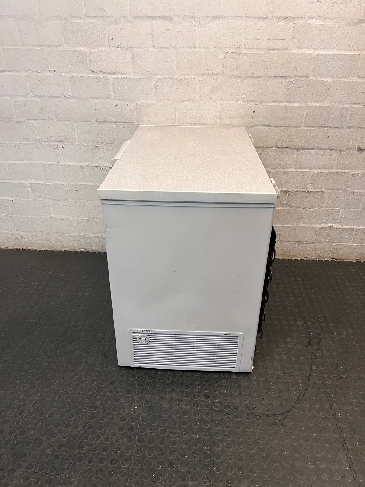 KIC White Chest Freezer with Grey Lid — Not Reaching Freezing Temperatures; Minor Cosmetic Damage – back view