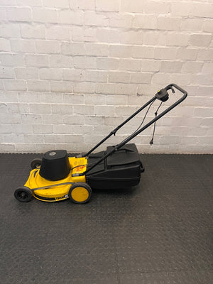 Electric Rotary Lawnmower in Yellow and Black — Trips Power Supply; Non-Functional – back view
