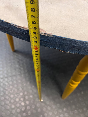 Round Yellow Wood Outdoor Table with Blue Trim — Visible Wear and Surface Staining – height measurement