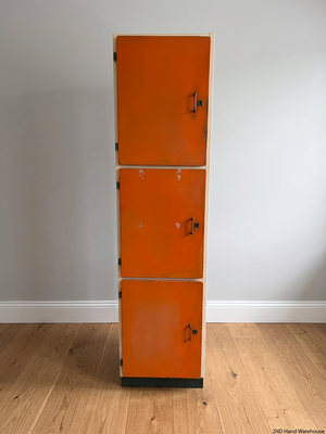 Tall Orange and White Three-Door Storage Cupboard — Well Used with Visible Marks and Scuffs – styled product image