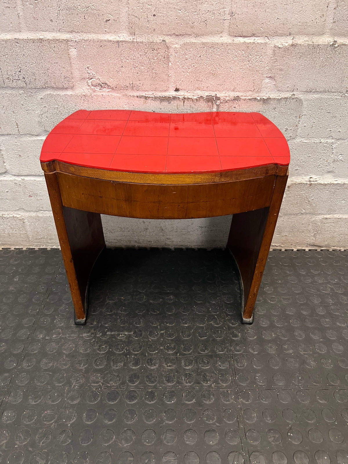 Curved Wooden Stool with Tiled Red Top — Fair Used Condition with Surface Wear – main front view