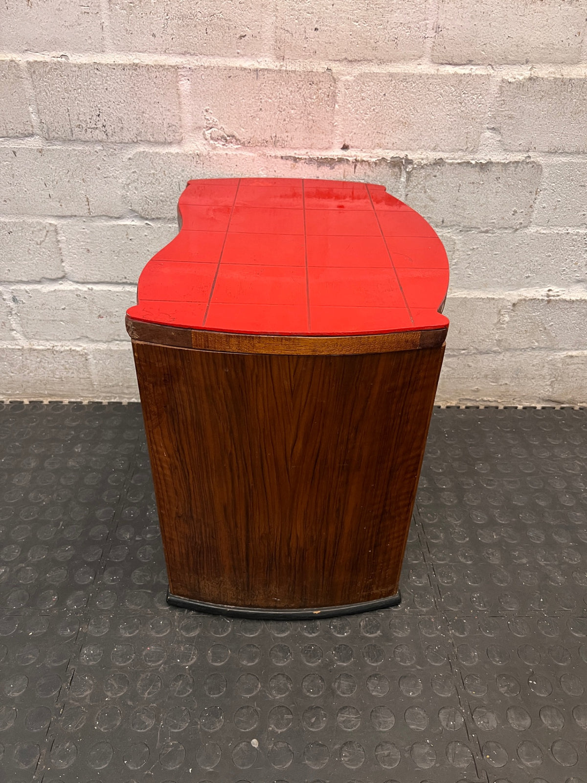 Curved Wooden Stool with Tiled Red Top — Fair Used Condition with Surface Wear – top view
