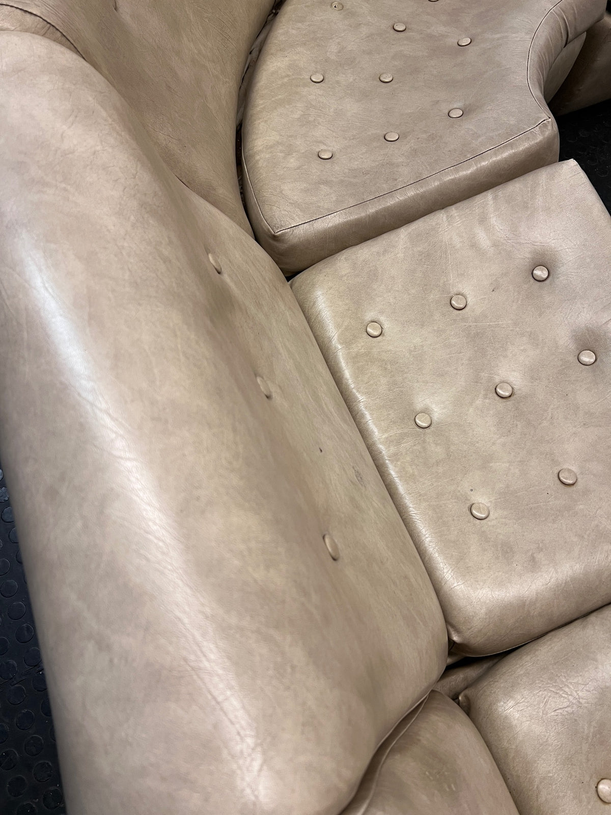 Beige L-Shape Curved Upholstered Corner Couch — Sagging Seats, Thin Padding, and Missing Buttons – back view