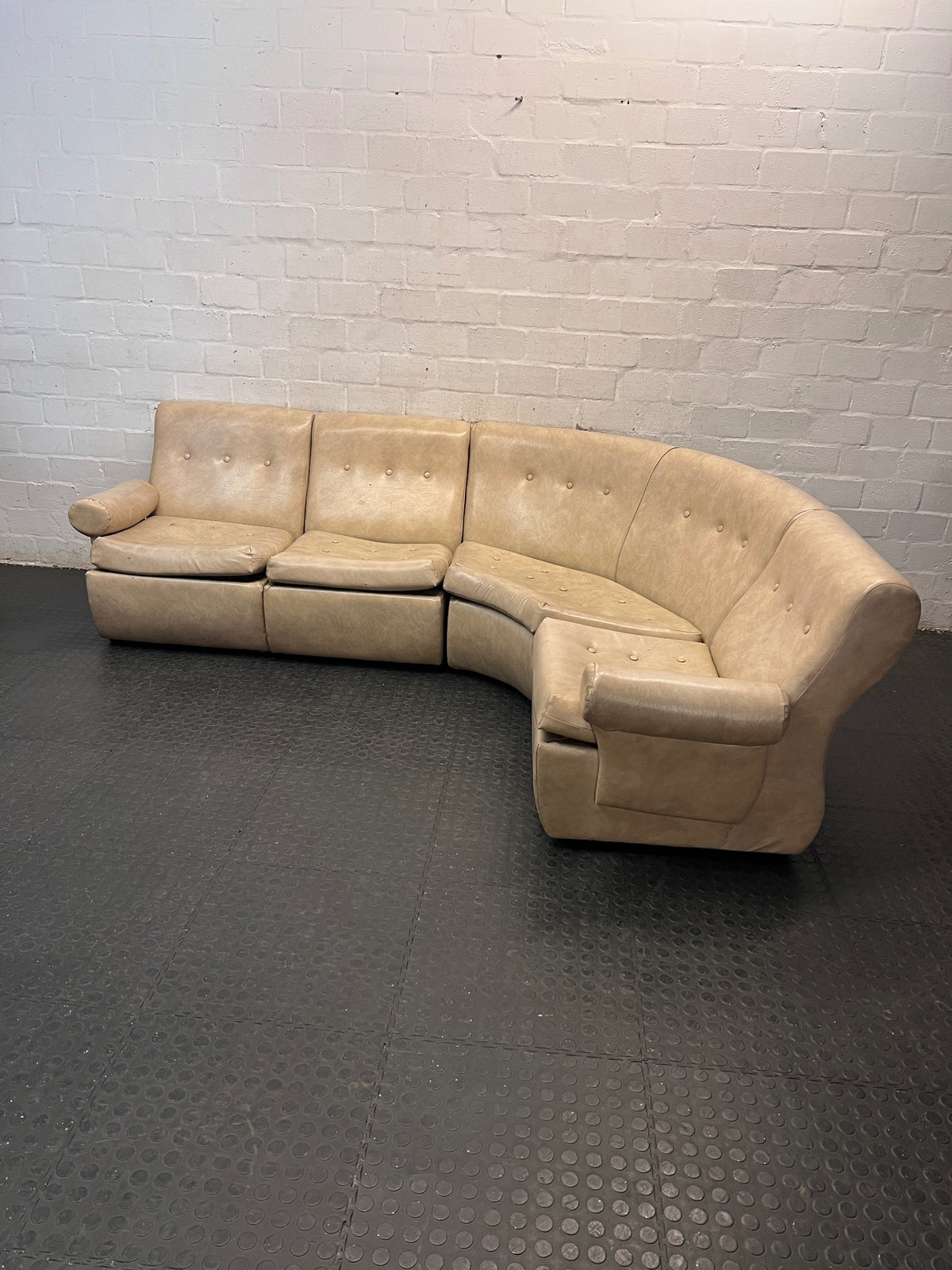 Beige L-Shape Curved Upholstered Corner Couch — Sagging Seats, Thin Padding, and Missing Buttons – top view