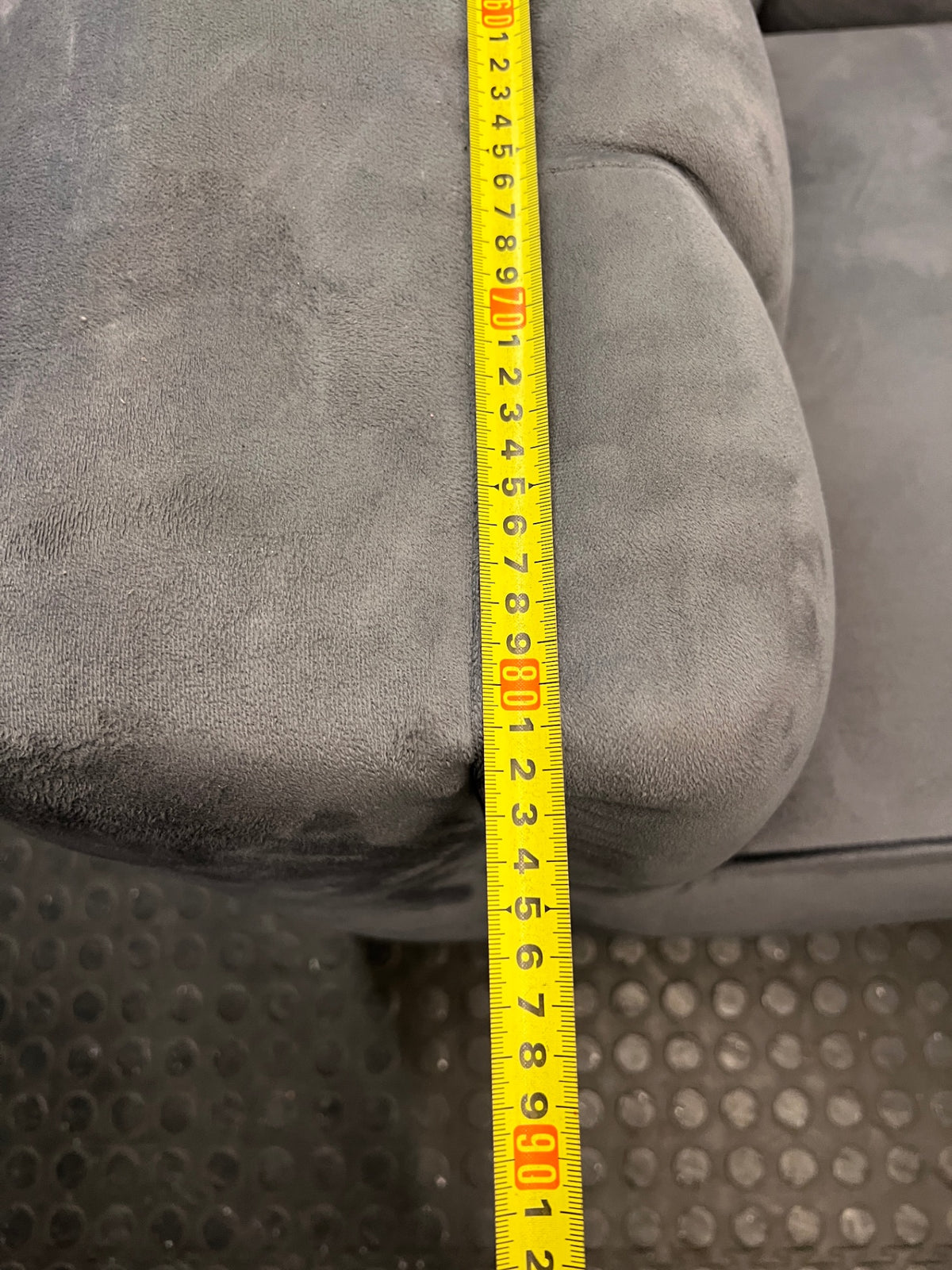 Grey Two Seater Couch with Vertical Stitching — Upholstery Has Wear and Tear – depth measurement