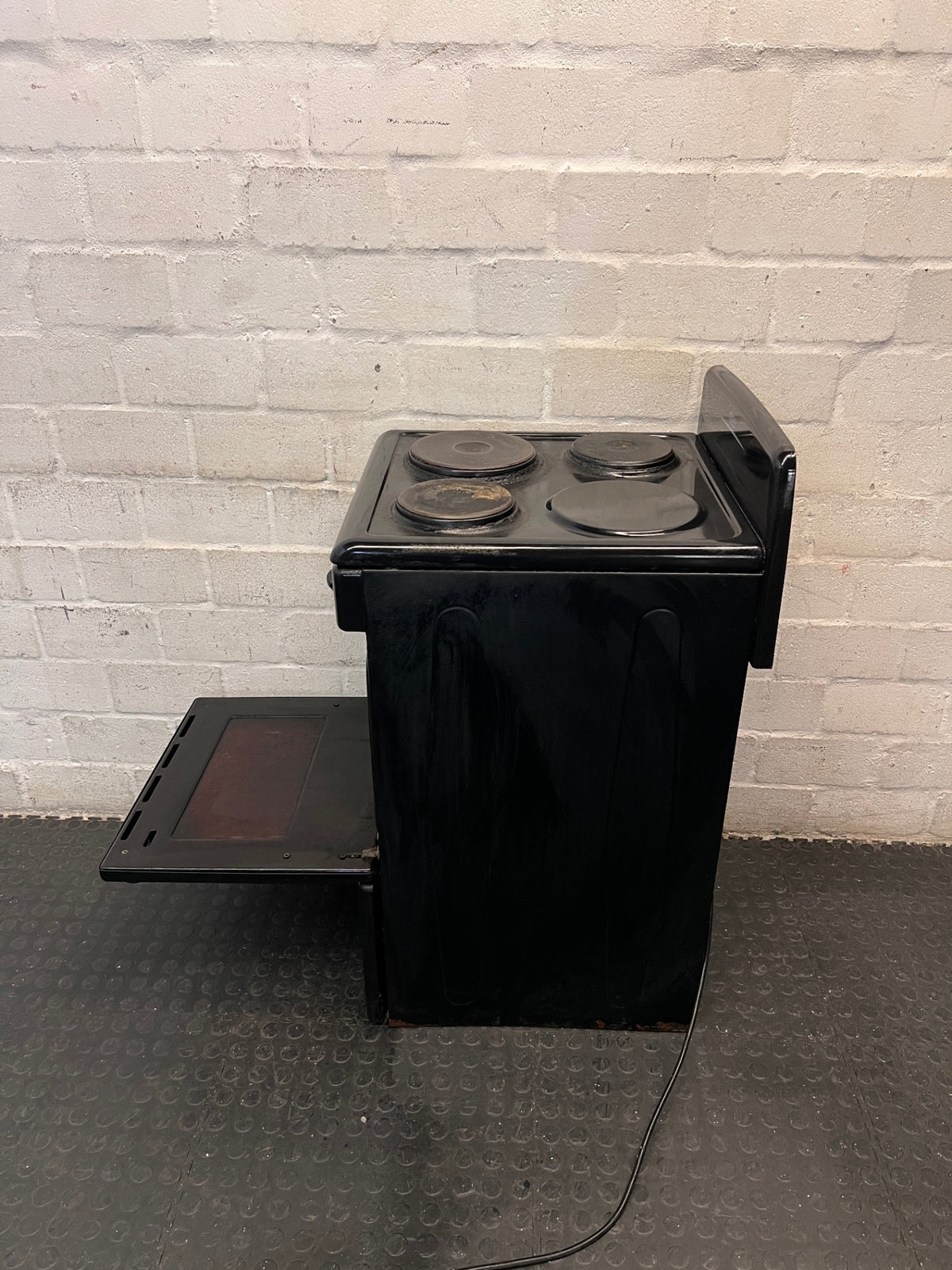 Defy Compact 3 Black Electric Freestanding Stove — Non-Functional Plate and Loose Oven Door – side view