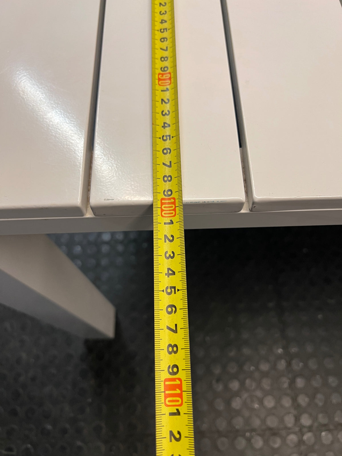 Cream Slatted Metal Outdoor Table — Well Used with General Outdoor Wear – depth measurement