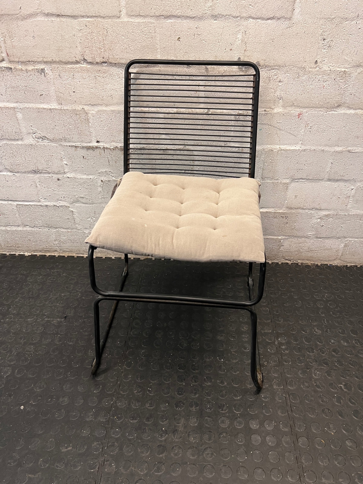 Black Steel Frame Dining Chair with Beige Cushion — Well Used State – main front view