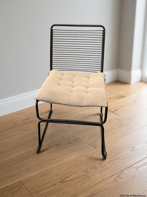 Black Steel Frame Dining Chair with Beige Cushion — Well Used State – styled product image