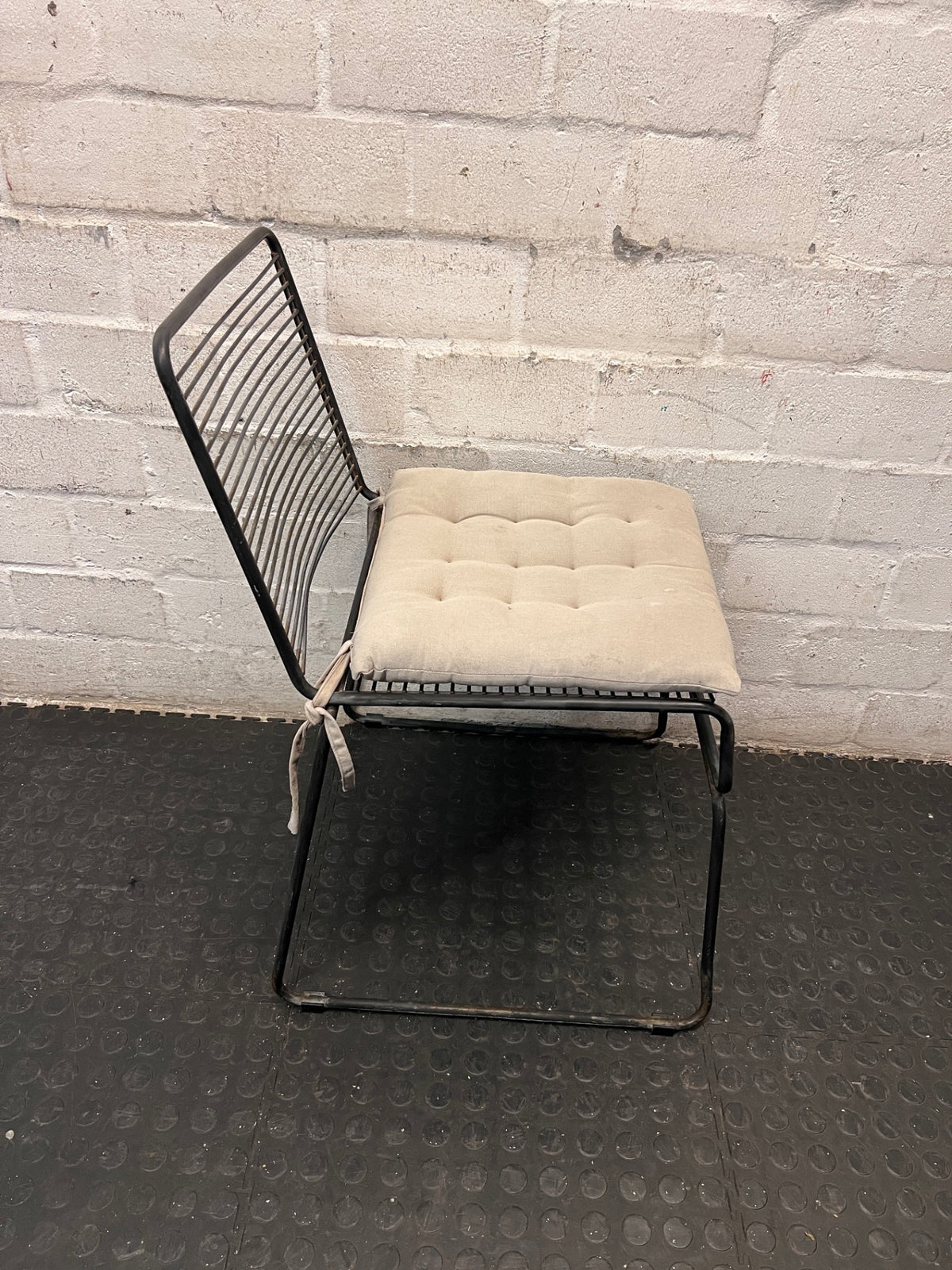 Black Steel Frame Dining Chair with Beige Cushion — Well Used State – top view