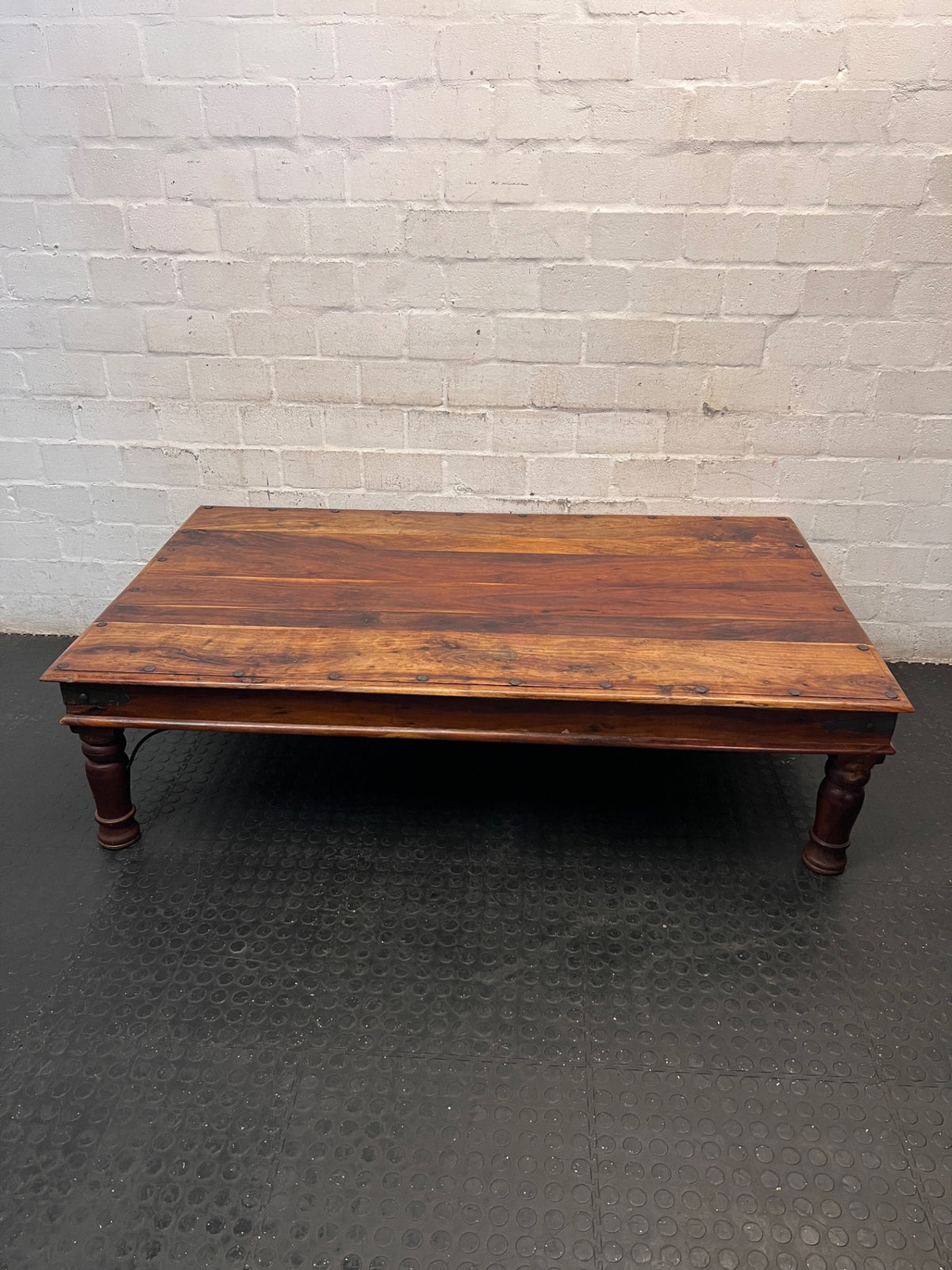 Large Rustic Wooden Coffee Table with Metal Studs — Good Working Order – main front view