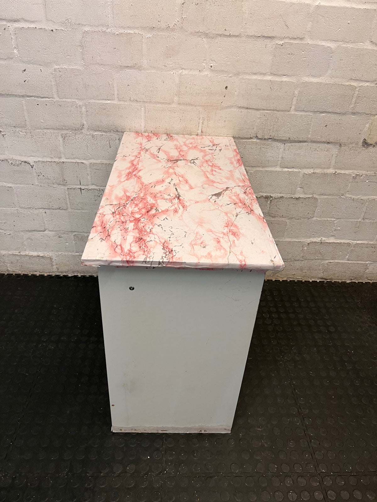 White Office Desk with Marble Pattern Top — Damaged Surface and Fair Condition – back view