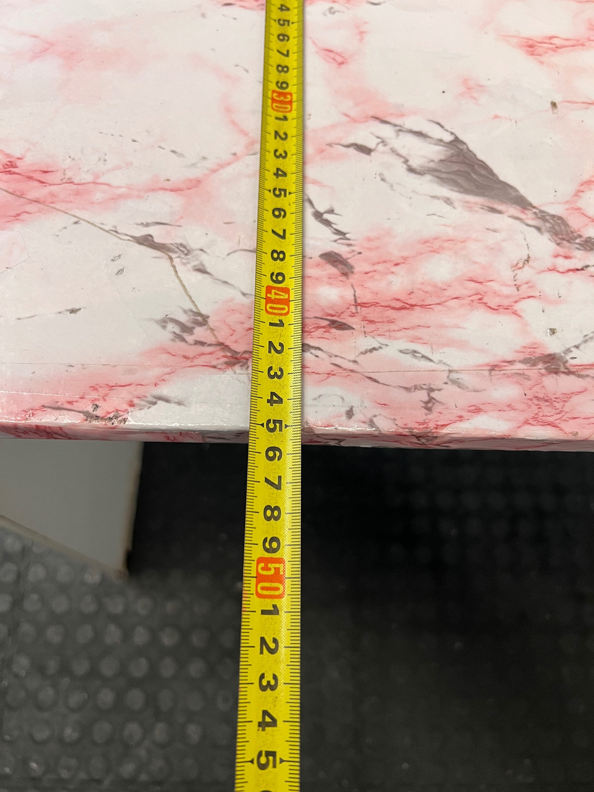 White Office Desk with Marble Pattern Top — Damaged Surface and Fair Condition – depth measurement