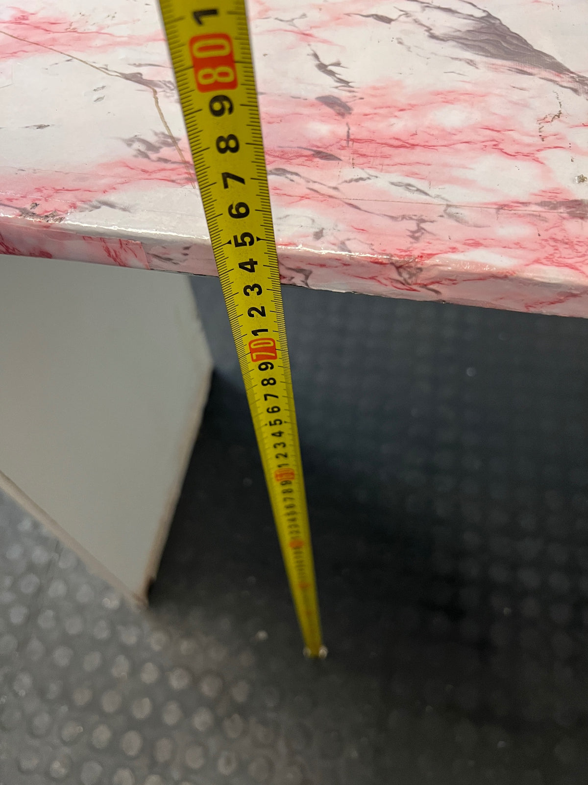 White Office Desk with Marble Pattern Top — Damaged Surface and Fair Condition – height measurement