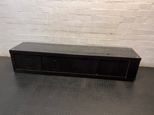 Sleek Black Glass-Top TV Unit with Storage — Good Working Order – top view