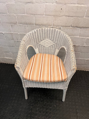 White Wicker Armchair with Striped Cushion — Wicker Coming Undone on Chair Back – main front view