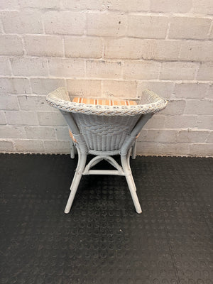 White Wicker Armchair with Striped Cushion — Wicker Coming Undone on Chair Back – top view