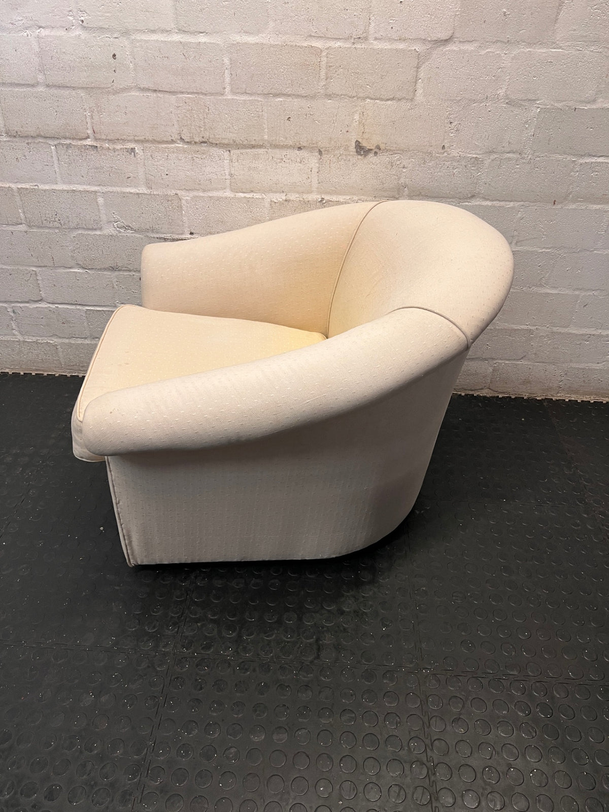 Cream Fabric Tub Chair with Scrolled Arms — Unstable Feet on One Chair; Well Used Condition – condition detail