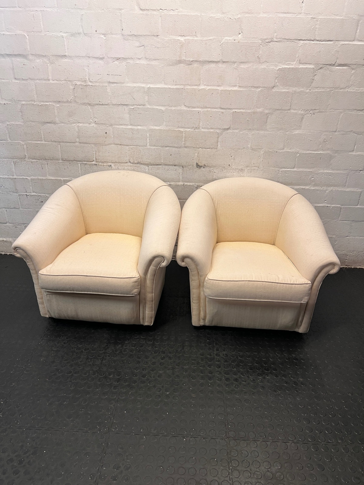 Cream Fabric Tub Chair with Scrolled Arms — Unstable Feet on One Chair; Well Used Condition – side view