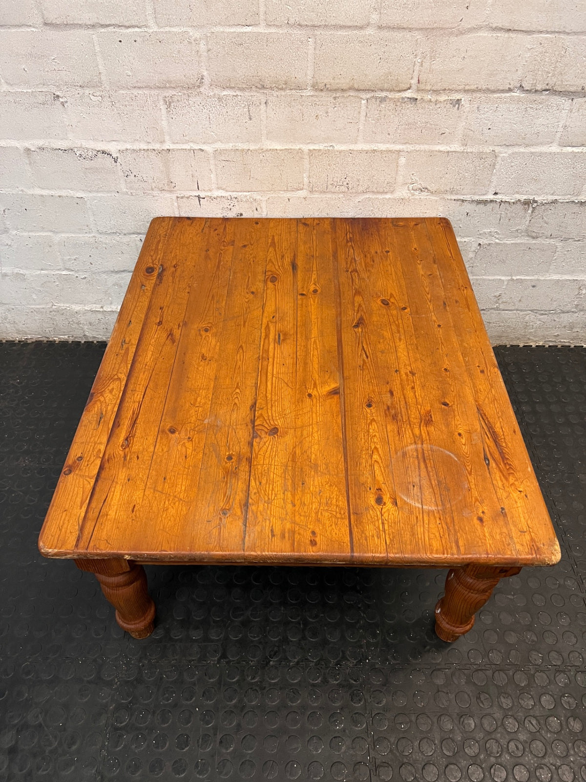 Rustic Wooden Coffee Table with Turned Legs — Surface Scratches and Water Stain on Top – top view