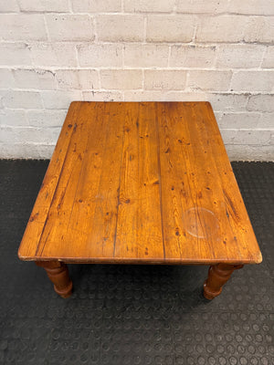 Rustic Wooden Coffee Table with Turned Legs — Surface Scratches and Water Stain on Top – top view
