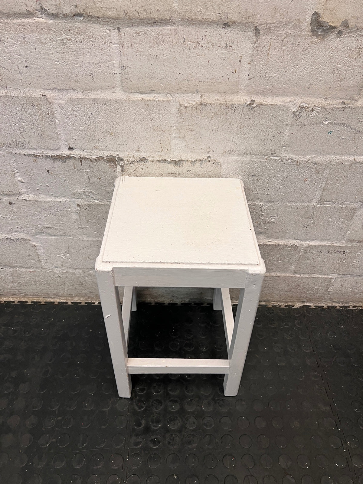 Compact White Wooden Side Table — Well Used Condition – back view